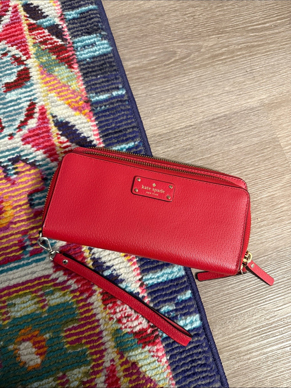kate spade red leather zip-around wristlet clutch